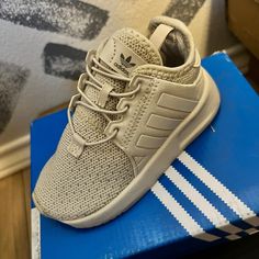 Brand New Size 6 Toddler Adidas Tan Royal Blue Sneakers, All White Sneakers, Toddler Adidas, Uniqlo Bags, Vintage Chanel Handbags, Seersucker Pants, Adidas Adilette, Swim Shoes, Adidas Ultra Boost