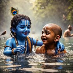 two children are playing in the water with their faces painted like lord and goddesses