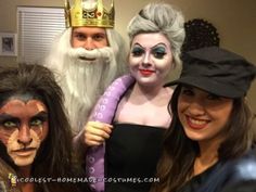 three women and one man are dressed up as evil queen and the other is king