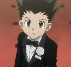 an anime character wearing a tuxedo and bow tie, looking at the camera