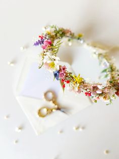 Wild flowers hair crown in meadow style. Perfect for weddings or proms and other special events. The flower crown is made of artificial and preserved flowers and other trinkets used for arranging.  SMALL BOUQUET: https://www.etsy.com/uk/listing/1676614854/small-summer-bouquet-flower-bouquet-for?click_key=32b1592cfd3cc8548476fe015f8cf4360d73029b%3A1676614854&click_sum=f0e28b1c&ref=related-4&sts=1 MEDIUM BOUQUET: https://www.etsy.com/uk/listing/1676592490/boho-summer-bouquet-bridal-flower?click_ke Flowers Headpiece, Wildflower Crown, Handmade Flower Crown, Flower Wreath Hair, Flower Crown Bridesmaid, Flower Veil, Wedding Hair Wreath, Bride Crown, Flower Wreaths