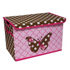 a pink and brown toy box with a butterfly on it's side, decorated with white polka dots