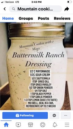 a jar of buttermilk ranch dressing sitting on a counter