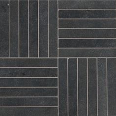 a black tile floor with vertical lines on the bottom, and diagonals in grey