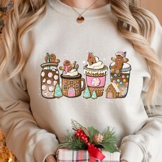 Gingerbread Christmas Coffee Shirt, Christmas coffee Sweatshirt, women Holiday sweater, Xmas Tee, Coffee Lover gift Suitable for many occasions such as Christmas, Father's Day, Mother's Day, birthday This classic crew-neck sweatshirt is an essential basic item for anyone’s wardrobe. The ribbed cuffs on the sleeves and waist are reinforced, and the high-quality cotton ensure that anyone will enjoy this cuddly and cool sweatshirt for many moons to come. Preshrunk fleece knit Double-needle stitchin Xmas Tees, Coffee Tees, Coffee Sweatshirt, Coffee Lover Gift, Gingerbread Christmas, Coffee Shirt, Coffee Print, Coffee Shirts, Sweatshirt Christmas