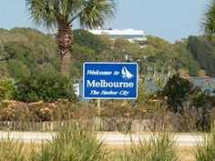 there is a blue sign that says melbourne on it