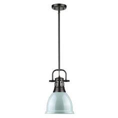 an industrial style light fixture with a glass shade on the bottom and black metal fittings