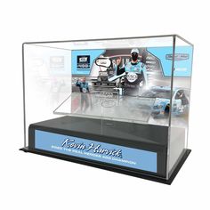 a display case with two cars in it