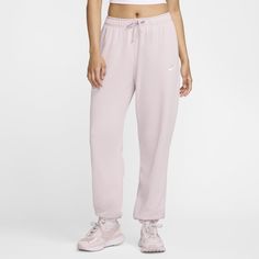 Soft and warm, these oversized Club Fleece sweatpants are perfect for days when comfort is everything. Loose through the hip and thigh, the leg is finished with an elasticated cuff at the ankle for a perfectly cinched-in look. Pink Nike Sweatpants, Trendy Pink Full Length Sweatpants, Nike Pink Sweatpants, Nike Sweatpants Pink, Baggy Pink Wide-leg Sweatpants, Cheap Pink Full-length Sweatpants, Pink Relaxed Fit Wide-leg Sweatpants, Sweatpants Nike, Oversized Sweatpants