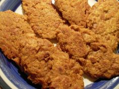 some fried food on a blue and white plate