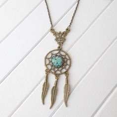 These unique, large dream catcher necklace are handcrafted with beautiful turquoise real flower .These gorgeous necklace are large dream catchers with hanging feather charms. Total pendants: 90mm ( 3") Necklace lenght: around 66 cm (26 inch aprox.) Chain : 16"-41 cm; 18"-46 cm ; 20"-51 cm ; 22"-56 cm; 24"-61 cm 26"-65 cm 28"-71 cm 30" - 75 cm Brand New ~ Handmade. Dream catcher earrings: https://www.etsy.com/listing/639516332/bronze-dreamcatcher-earrings-dream?ref=shop_home_active_1 All items in Dream Catcher Jewelry, Dreamcatcher Necklace, Dream Catcher Necklace, Dream Catcher Earrings, Flower Handmade, Boho Feathers, Jewelry Turquoise, Turquoise Flowers, Feather Pendant