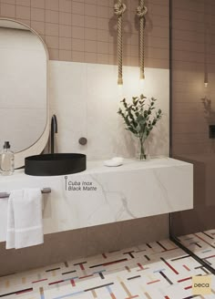 a bathroom with a sink, mirror and towel rack on the wall next to it