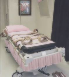 a bed that has some shoes on top of it