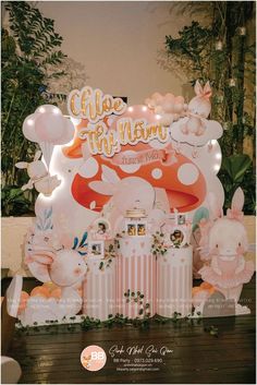 an image of a baby shower scene with balloons and decorations on the wall in front of it