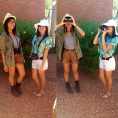 two women wearing hats and shorts are taking pictures