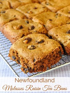 some brownies are cooling on a wire rack with the words newfoundland molasss raisin tea buns