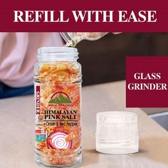 a glass grinder is next to a jar of himalayan pink salt with the caption reads, refill with ease