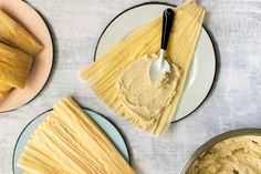 three plates filled with pasta next to each other