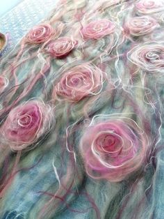 the yarn has been dyed pink roses on it