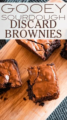 some brownies are on a cutting board with the words gooey sourdough discard brownies