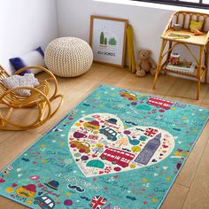 a child's room with a blue rug and rocking chair on the floor next to it