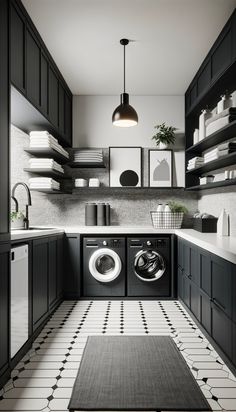 a black and white tiled floor in a kitchen with washer and dryer on the wall