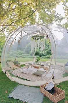 a hammock is set up in the grass