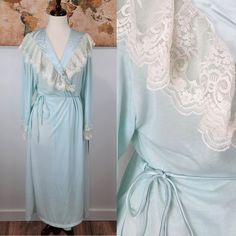 Vintage 1970s Era Polyester Mint Or Seafoam Green Maxi Length Nightgown Robe. Elegant House Robe With Matching Waist Tie And Lace Detailing. Brand New Condition, Original Tag Still Attached! Size Medium. Bust 30" But Variable With The Waist Tie Length 50" Vintage Spring Loungewear Robe, Spring Vintage Robe For Loungewear, Spring Vintage Loungewear Robe, Vintage V-neck Nightgown For Spring, Vintage Spring Robe With Lace Trim, Vintage Lace Trim Robe For Spring, Vintage Spring Robe For Home, Spring Vintage Robe With Lace Trim, Lace Trim V-neck Robe For Daywear