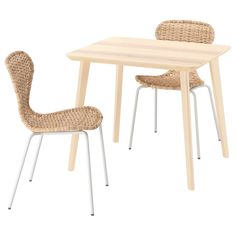 the table and chairs are made out of wicker