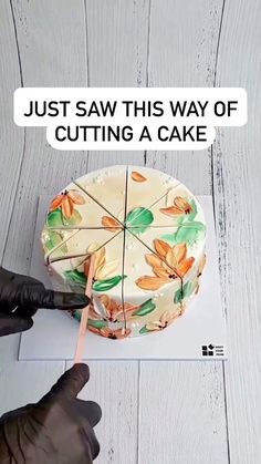 someone is cutting into a cake with an umbrella on the top that says, just saw this way of cutting a cake