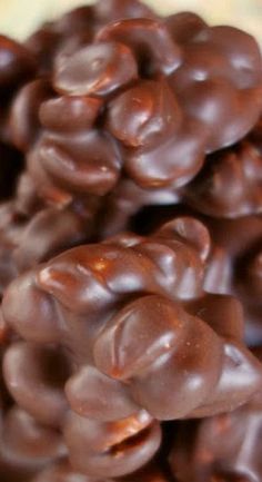 close up view of chocolate coated donuts