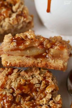 three pieces of apple oatmeal cookie sitting on top of each other