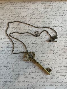 This amazing skeleton key is 4 inches in length hanging on a 24 inch bronze chain with an adorable lock and key toggle Gold Skeleton, Skeleton Key Necklace, Key Pendant Necklace, Skeleton Keys, Skeleton Key, Key Necklace, Lock And Key, Key Pendant, Skeletal