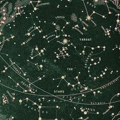 the stars in the night sky are drawn on green paper with gold trimmings