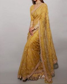 bridal lehenga,red bridal lehenga,sabyasachi bridal lehenga chandni chowk,chandni chowk lehenga shopping,bridal lehenga collection,bridal lehenga designs 2021,latest bridal lehenga designs,lehenga,bridal lehenga designs,expensive bridal lehenga,designer lehenga chandni chowk,designer lehenga,indian wedding lehenga for bride,lehenga with price,wedding lehenga Yellow Sari, भारतीय दुल्हन संबंधी, डिजाइनर कपड़े, Sarees For Girls, Indian Sari Dress, Sari Dress