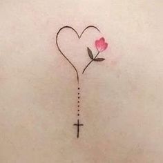 a heart with a cross on it and a flower in the shape of a heart