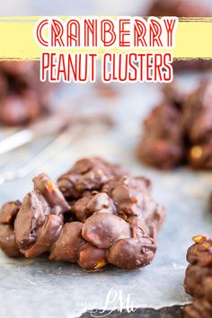 chocolate cranberry peanut clusters on a baking sheet