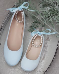 "THIS LISTING IS AVAILABLE IN WOMEN & KIDS SIZES Satin flats with gorgeous row of pearls and rhinestones ankle strapfor comfort and simple chic style. You can choose at checkout to do pearls ankle strap with SILVER BEADS OR GOLD BEADS MATCHING BRACELET & NECKLACE IS AVAILABLE, PLEASE CLICK LINK: https://www.etsy.com/listing/483923578/silver-pearls-bracelet-necklace-with?ref=shop_home_active_2&frs=1 DETAILS: COLORS AVAILABLE: White, Off white, Blush, Black, Light Blue, Champagne and W Elegant Blue Ballet Flats, Elegant Blue Closed Toe Ballet Flats, Flower Girls Shoes, Simple Chic Style, Shoes Light Blue, Bridesmaids Shoes, Silver Pearl Bracelet, Flower Girl Shoes, Bridal Flats