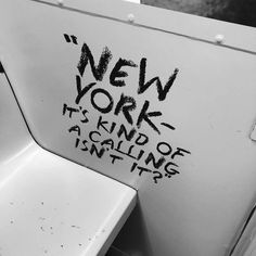 graffiti on the side of a toilet in a public restroom, that says new york it's kind of a calling isn't it?