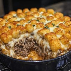 a deep dish casserole with cheese and meat