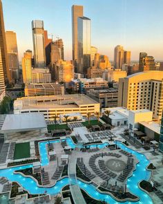 an aerial view of the city skyline and pool