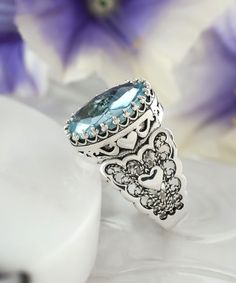 Ladies, from casual dates to fancy parties and weddings, our 925 Sterling Silver Filigree Art Cocktail Ring is an ideal gift choice for women who loves jewelry. Whether you're a gem lover or a wearer of handcrafted jewelry, this ring will surely delight you with its designer's artistry and craftsmanship. We have carefully handpicked various stones that are used in making this ring so that it reflects both your taste as well as personality. This ring features Amethyst, Blue Topaz, Carnelian, Ruby Luxury Filigree Topaz Ring For Formal Occasions, Silver Heart Cut Topaz Ring Gift, Heart Cut Silver Topaz Ring For Gift, Elegant Heart Ring Stamped 925, Elegant Stamped 925 Heart Ring, Filigree Topaz Ring Gift, Gift Topaz Ring With Intricate Design, Blue Elegant Heart Ring For Gift, Elegant Blue Heart Ring For Gift