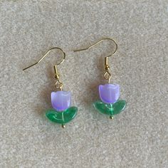 - Pretty Floral Earrings Featuring Light Purple Tulips - Handmade (By Myself) And Packaged With An Earring Card, Wrapped In A Cellophane Bagperfect For Gifts! - Beads Are Glass - Earring Cards That The Earrings Are On Are 6cm (Width) And 9cm (Length) For Size Reference - These Are Pretty Lightweight - On Gold Colored Fishhook Earring Hooks Check Out My Closet For More Handmade Jewelry Tags: Dangly Earrings, Dangle Earrings, Floral Earrings, Flower, Pastel Earrings, Tulips, Spring Earrings, Summe Light Purple Tulips, Flower Pastel, Tulips Spring, Pastel Earrings, Skeleton Earrings, Earring Card, Spring Earrings, Purple Tulips, Antique Gold Jewelry