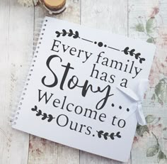 a notepad with the words every family has a story welcome to ourss