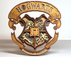 the hogwarts crest is made out of wood