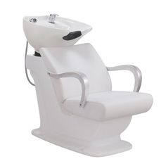 a white reclining chair with a sink attached to the back of it's seat