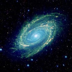 an image of a spiral galaxy in the sky