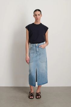 A classic calf length skirt in a slim fit, cut from our classic indigo dyed cotton denim that has been stone washed for a chic casual everyday feel. Classic Cotton Denim Skirt, Classic Dark Wash Cotton Denim Skirt, Classic Medium Wash Denim Skirt For Work, Chic Washed Denim Skirt, Relaxed Fit Denim Skirt In Medium Wash For Work, Relaxed Fit Medium Wash Denim Skirt For Work, Medium Wash Relaxed Fit Denim Skirt For Work, Workwear Cotton Denim Skirt In Medium Wash, Cotton Denim Skirt In Medium Wash For Work