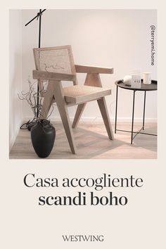 a chair and table in front of a white wall with the words casca cognite scandi boho