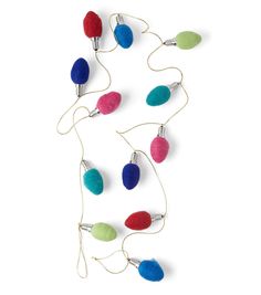 multi colored christmas lights on white background